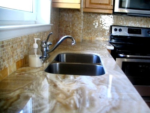 Onyx Countertop with Onyx Mosaic Backsplash